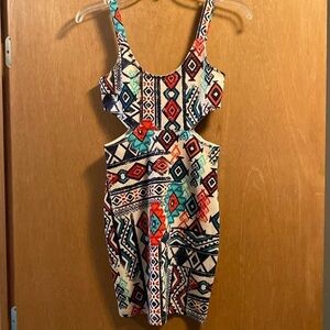 Love Culture sleeveless dress with cut out sides. Size small